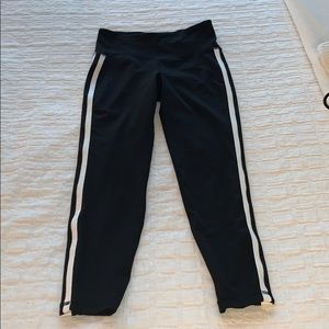 Black leggings with white stripe